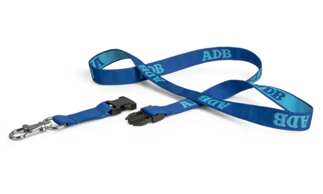 Schlichtes Lanyard mit Logowebung Dieses hochwertig nach Kundenwunsch produzierte Lanyard besticht durch seine schlichte Aufmachung. Ein schmales, zweifarbiges Lanyard mit gewebtem Logo.